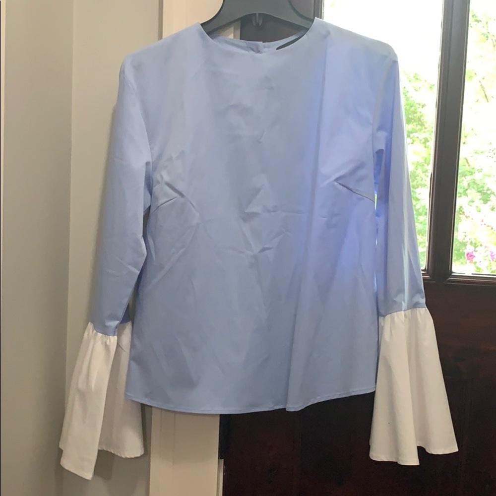 Baby blue blouse with puffy wrists